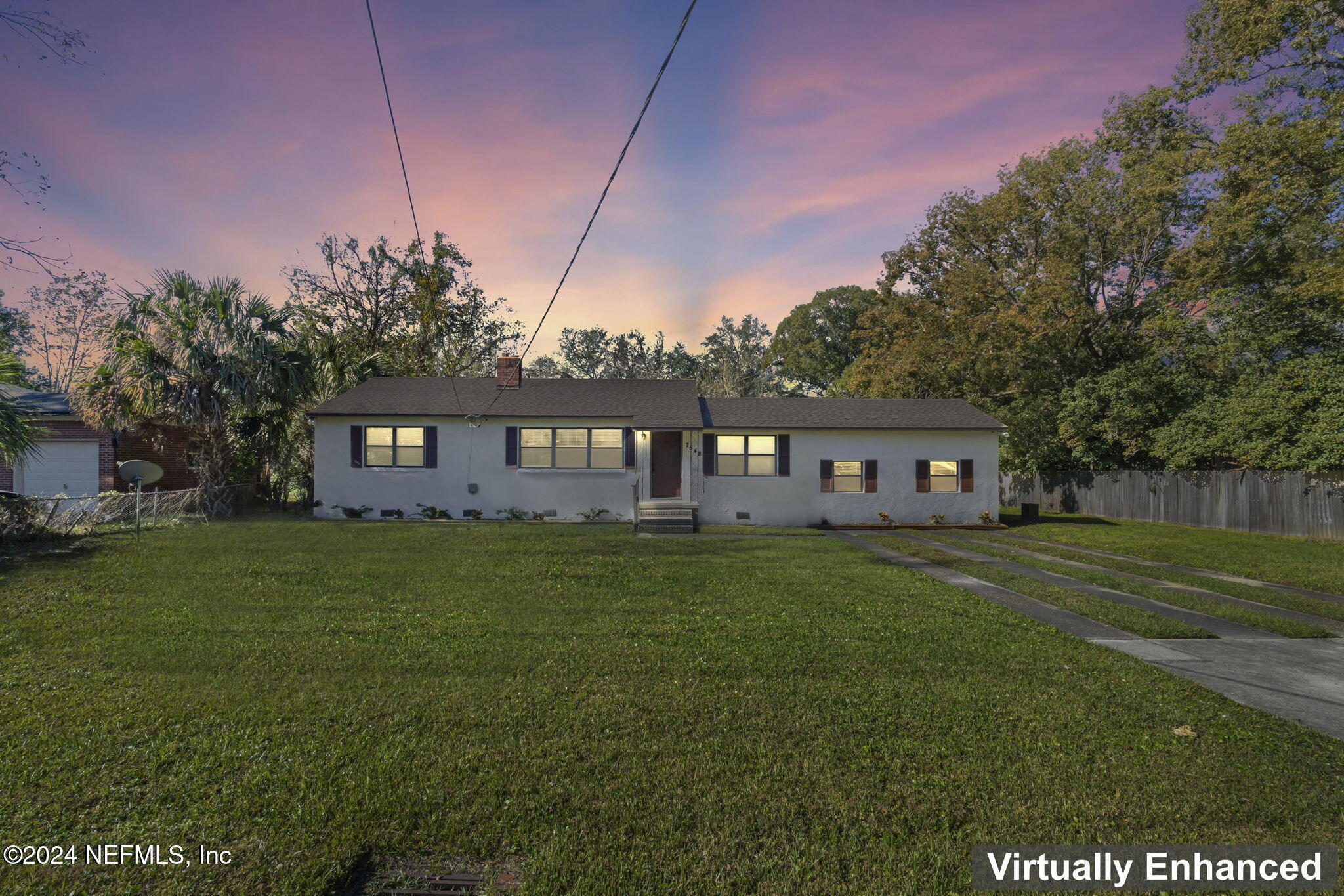 a view of a house with a big yard