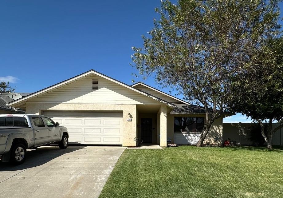 a view of a house with a big yard