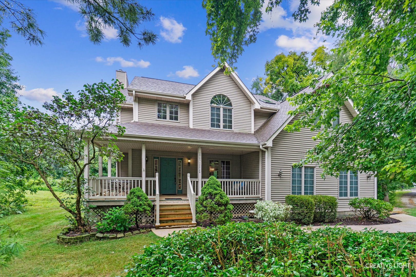 front view of a house with a yard