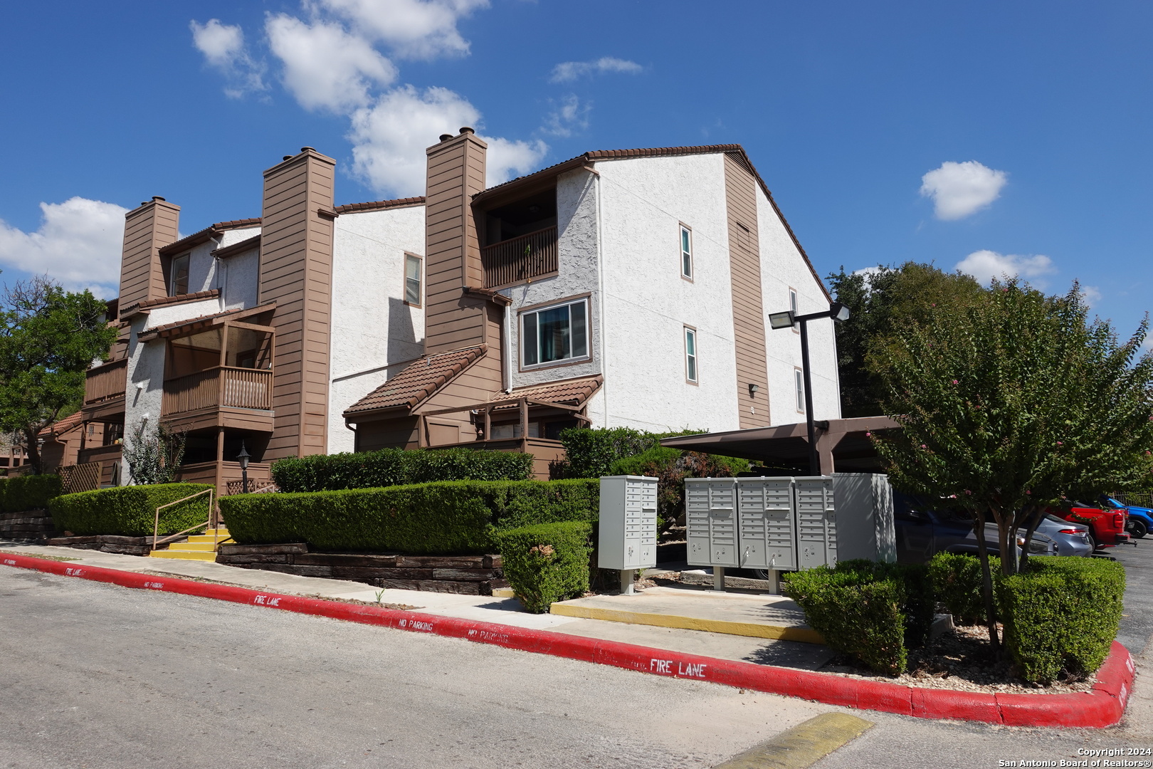 a front view of a house with yard