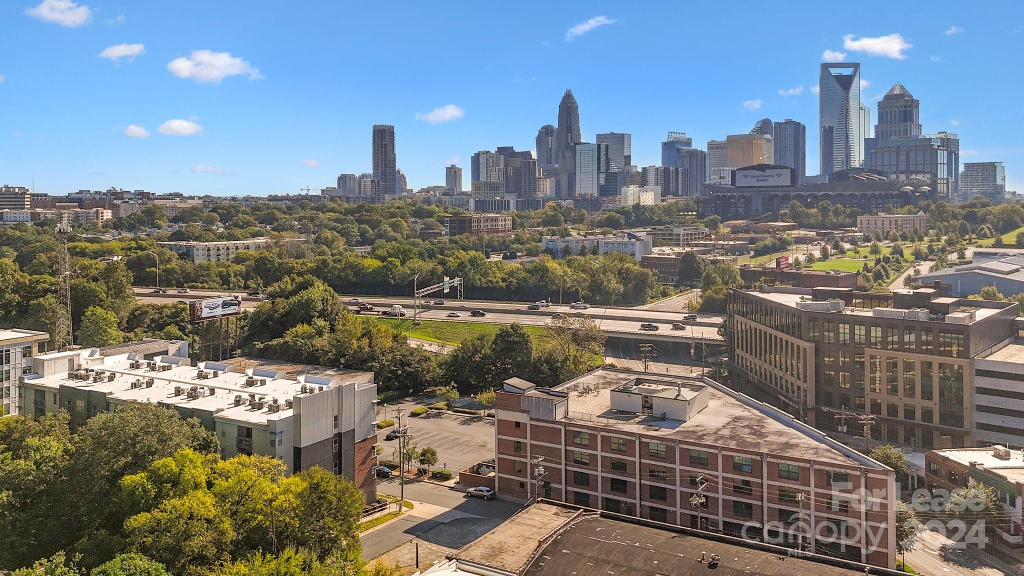 a city view with tall buildings