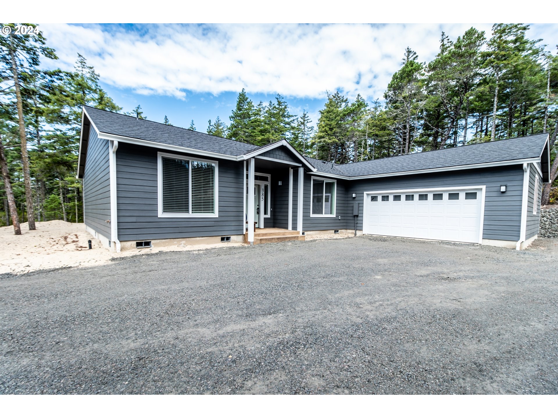 a view of outdoor space yard and garage