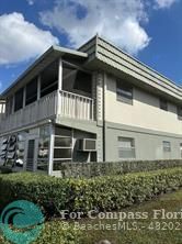 a view of a house with a balcony