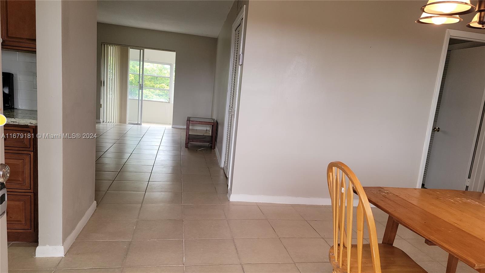 a view of livingroom with furniture and window