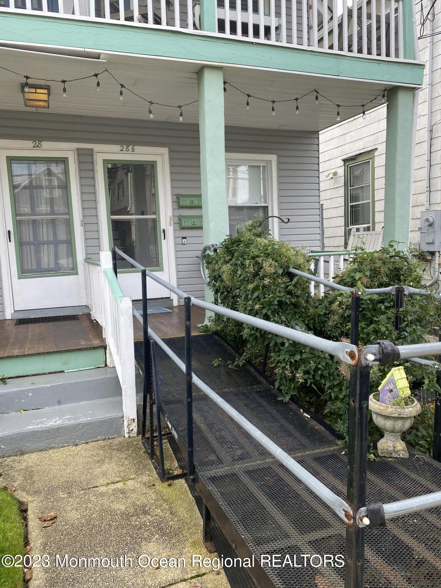 a view of a balcony with chairs