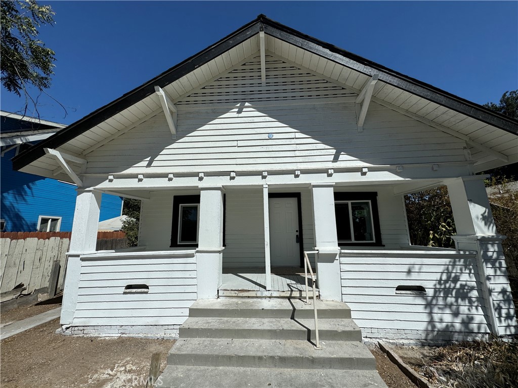 a front view of a house with a garage