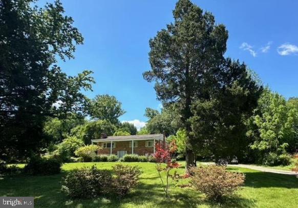 a house view with a garden space