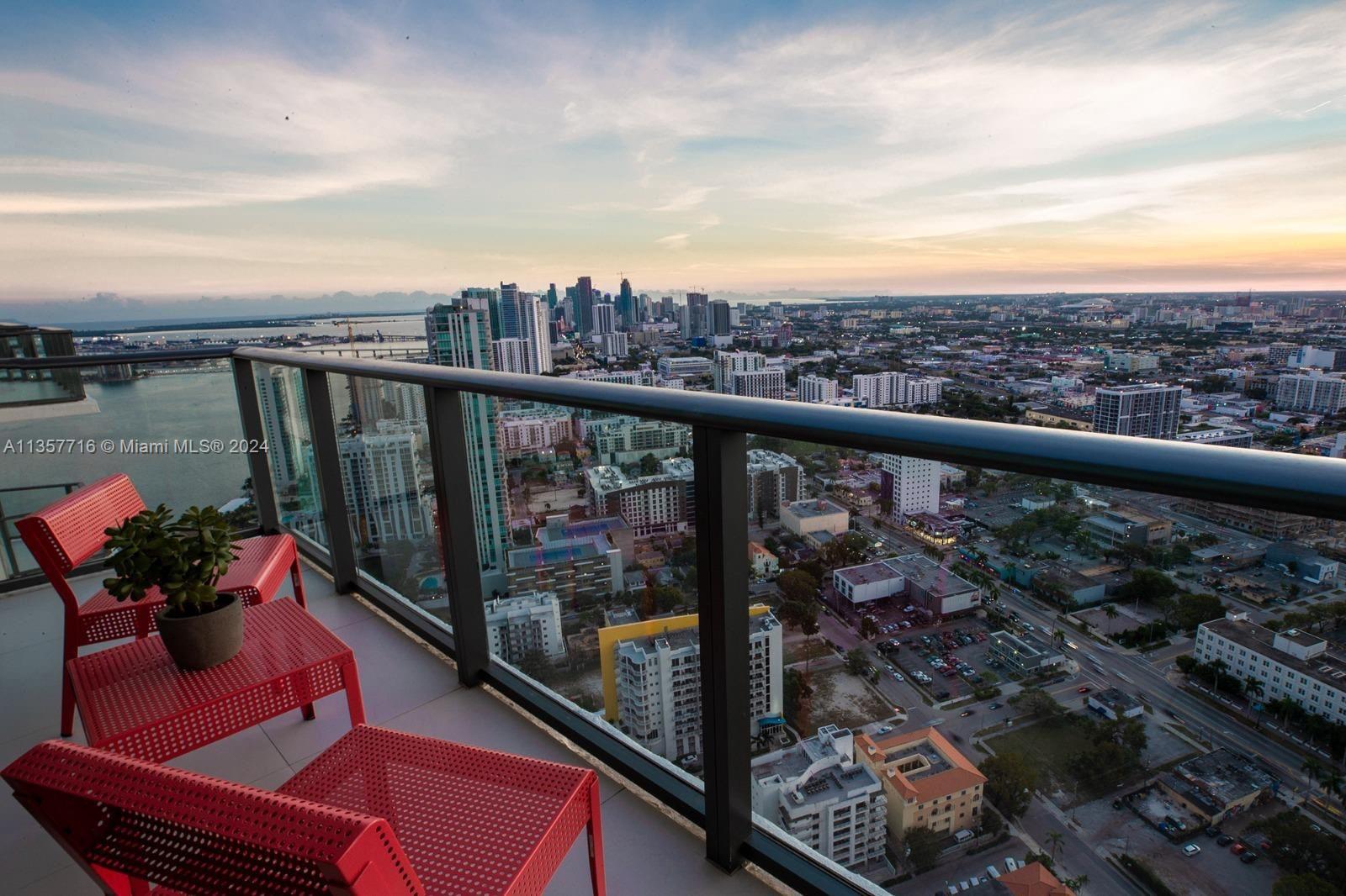 a view of city from a balcony