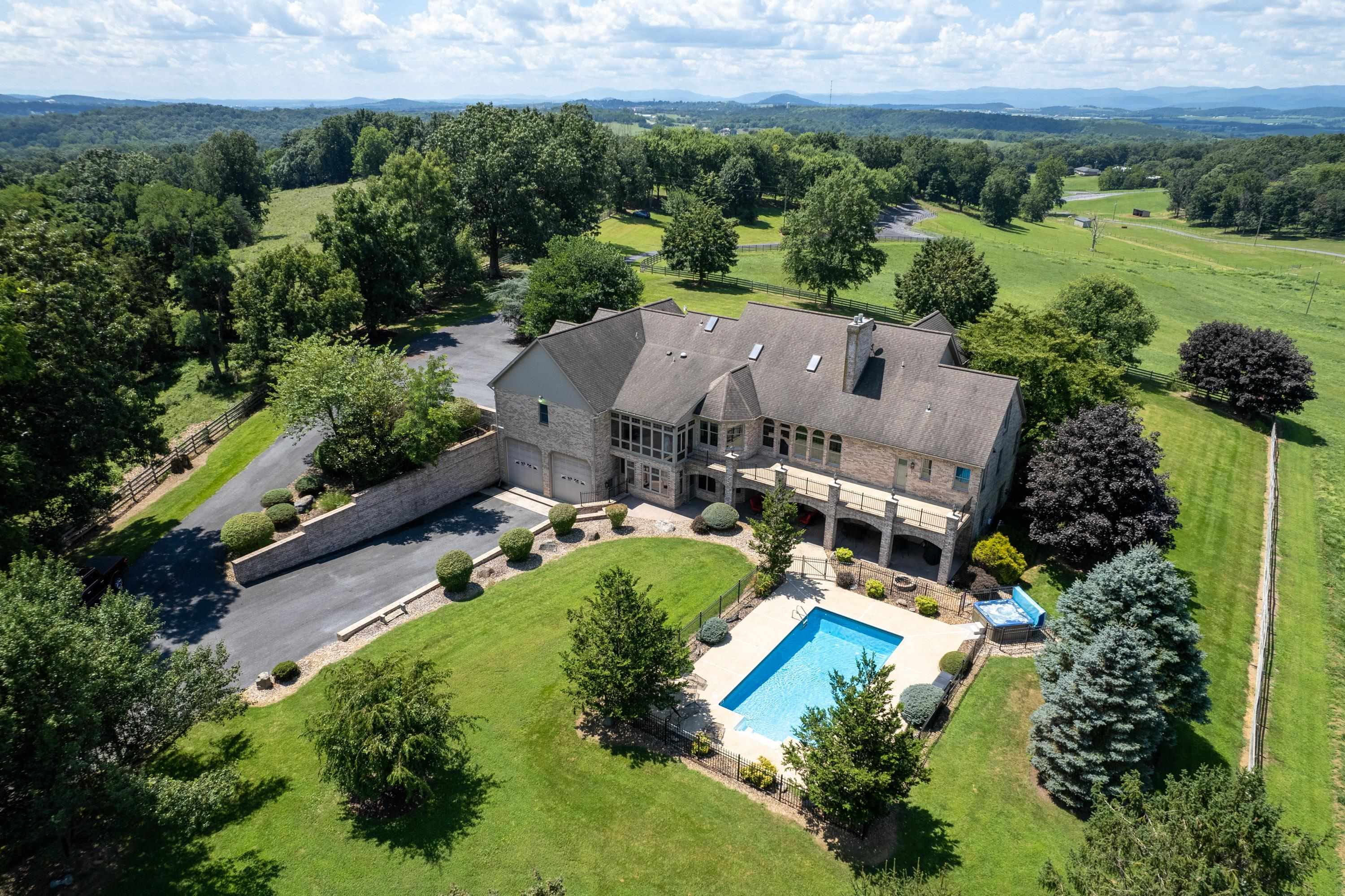 an aerial view of a house with garden