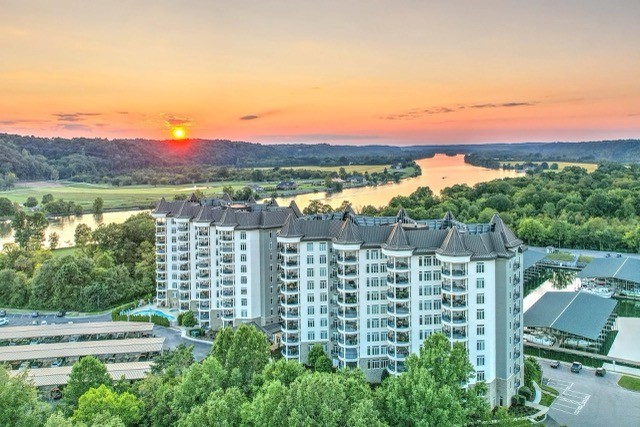 a view of lake with a city view