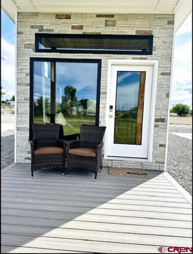 a bench sitting in front of a building