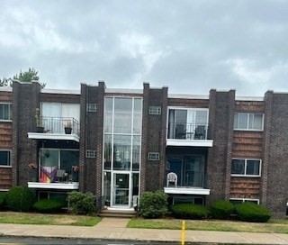 a view of a building and front view of a building