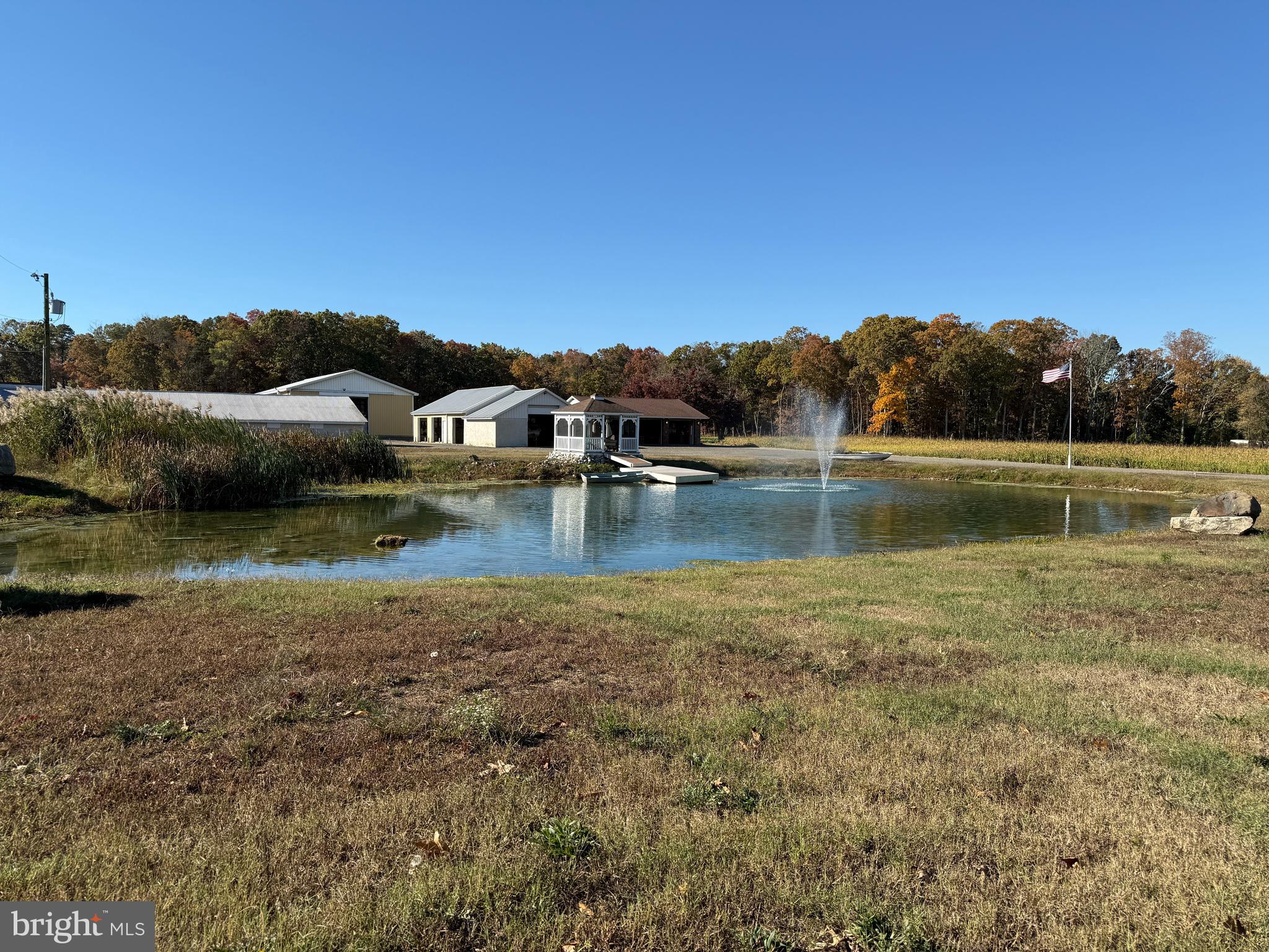 a view of a lake with houses in the background