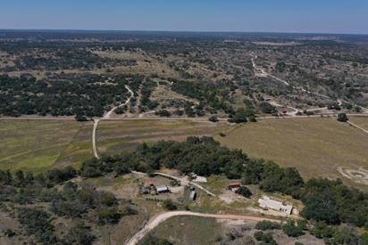 an aerial view of residential house with outdoor space