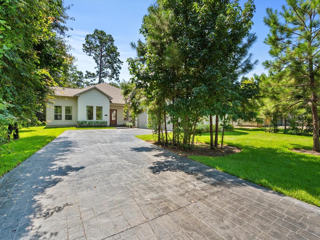 a view of house with outdoor space and street view