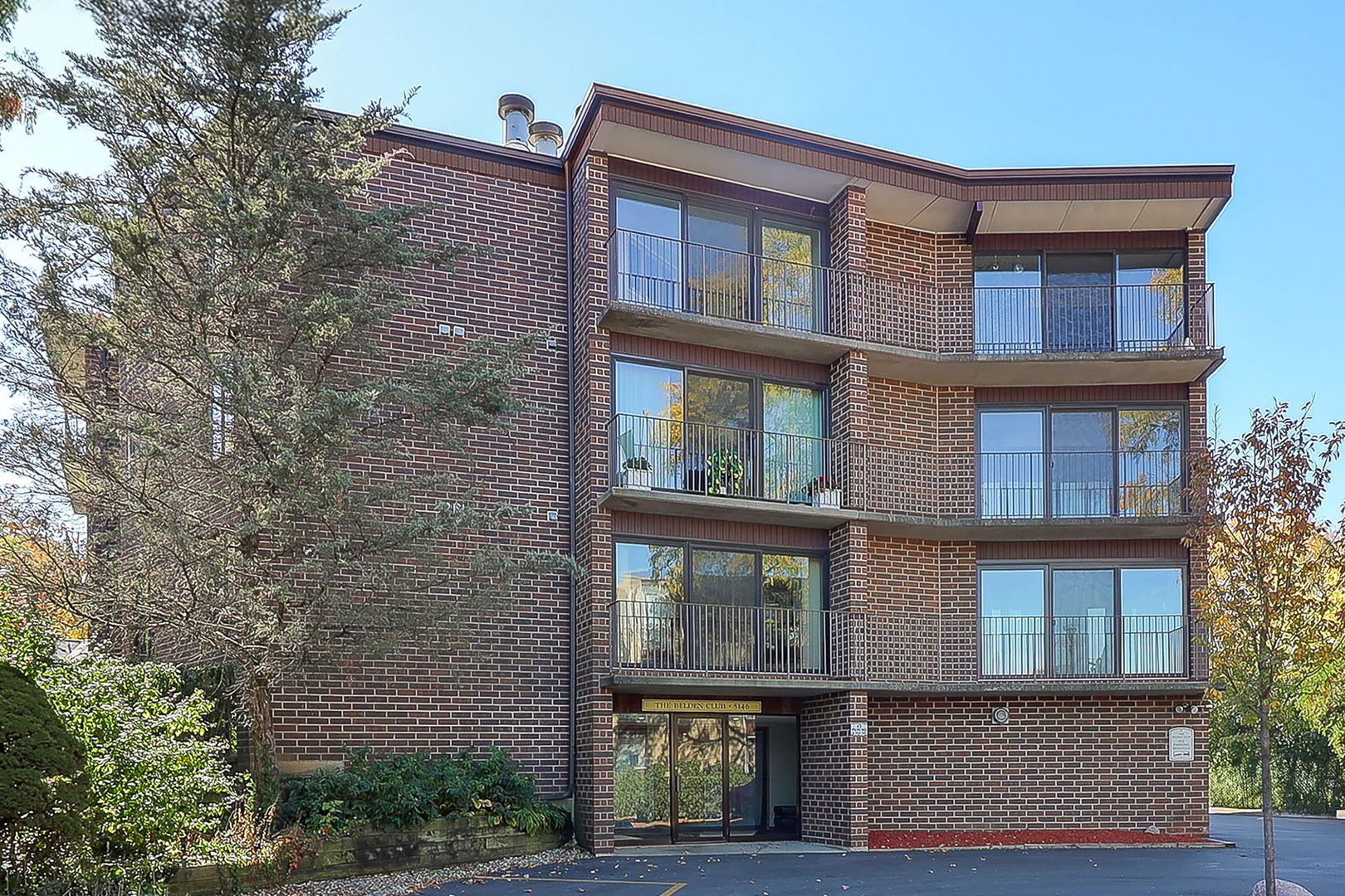 a front view of multi story residential apartment building