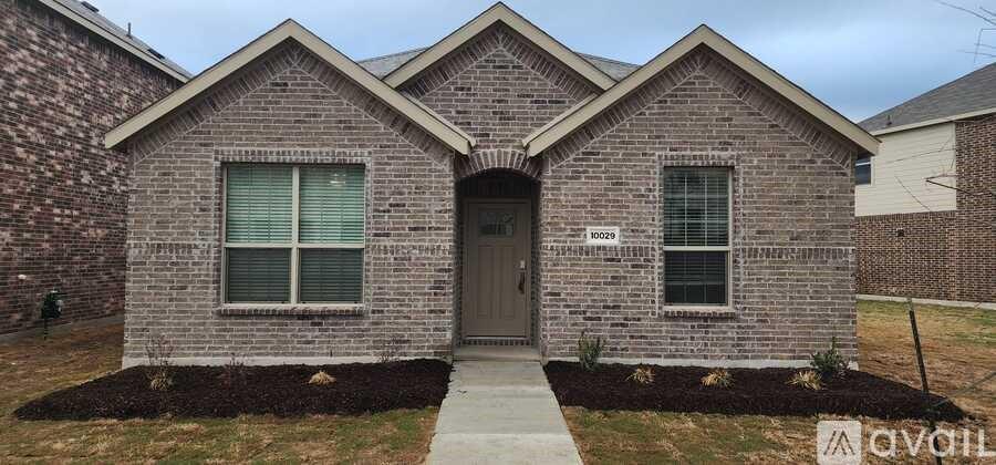 a front view of a house with windows