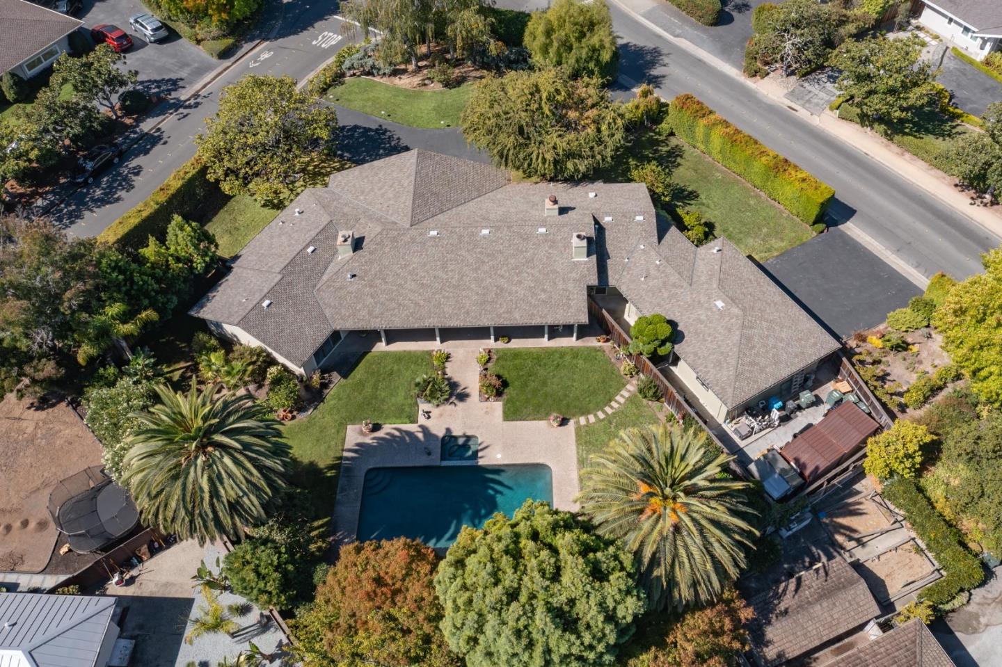 an aerial view of a house with a garden