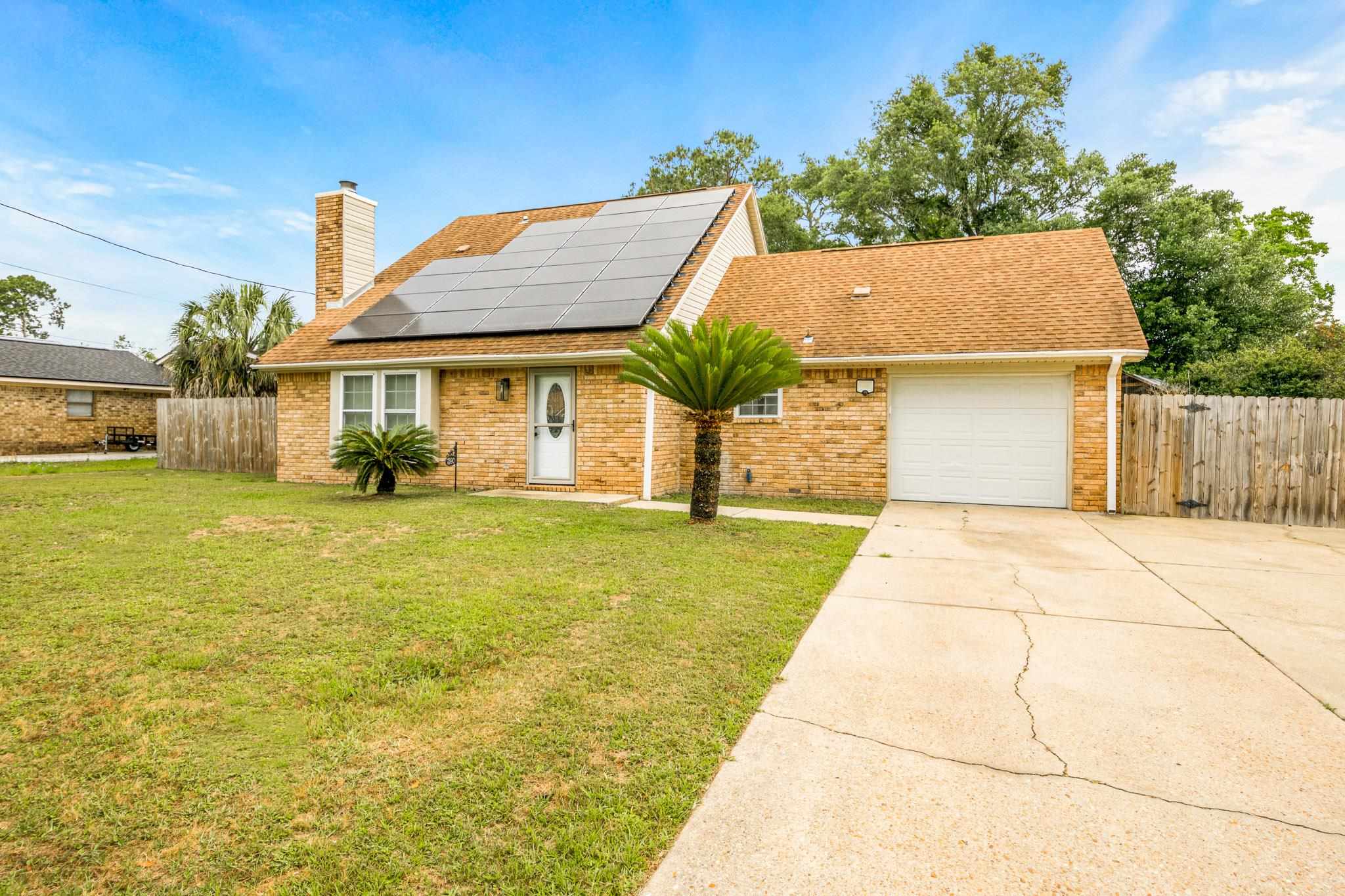 a view of a yard in front of house