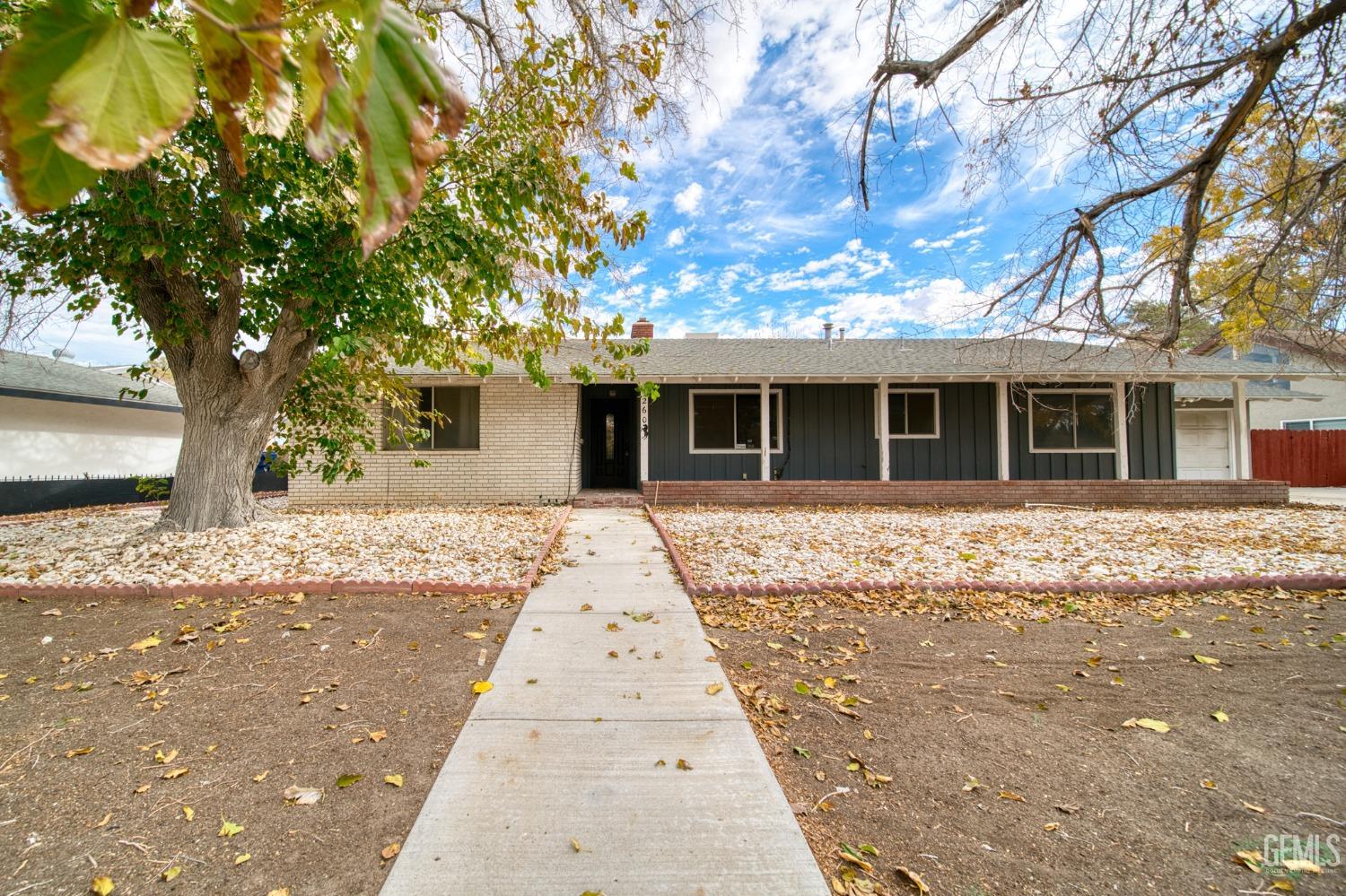 a front view of a house with a patio