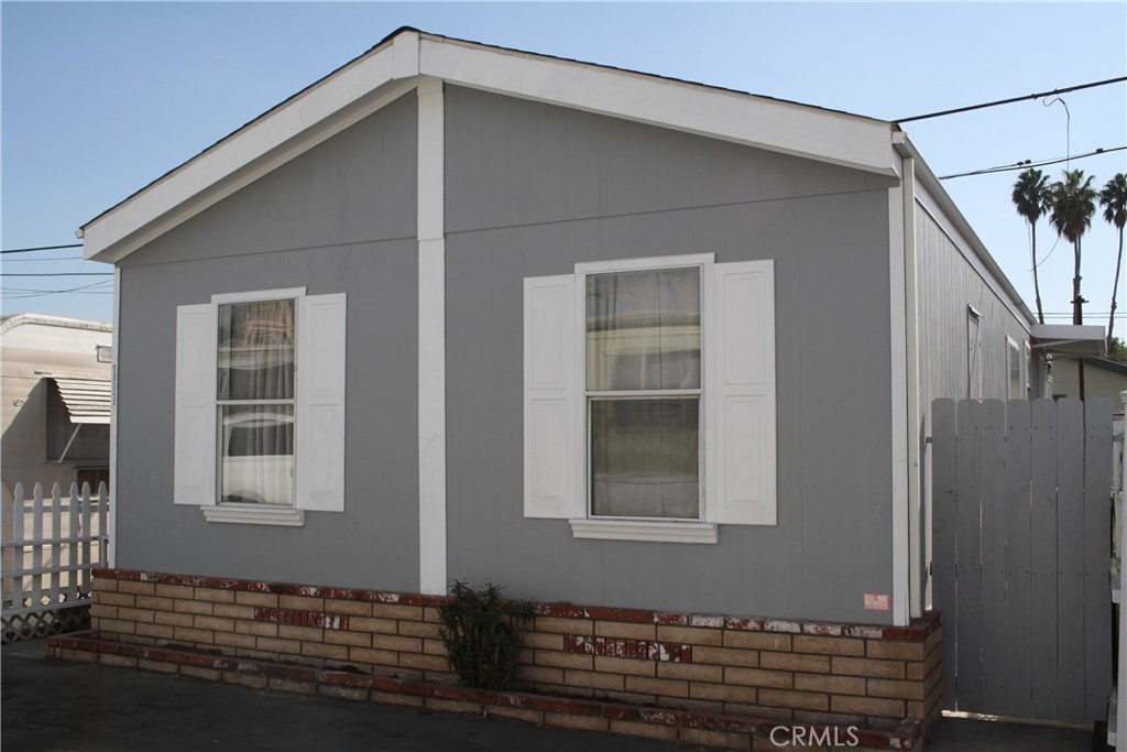 a house with trees in the background