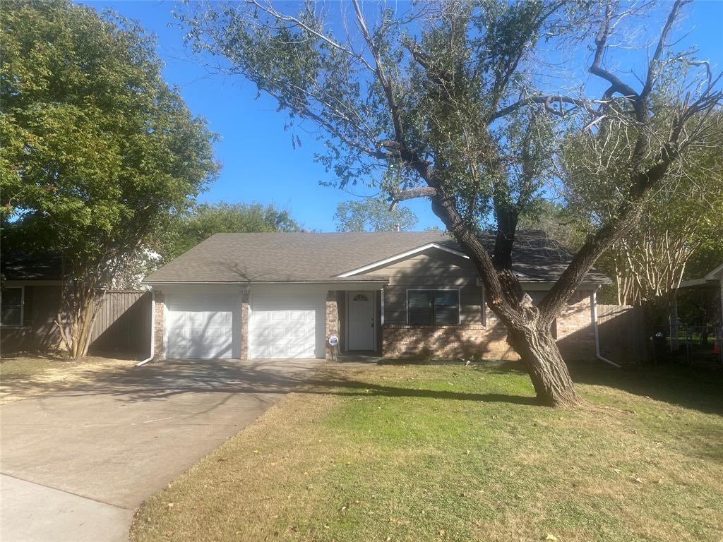 a house with trees in front of it