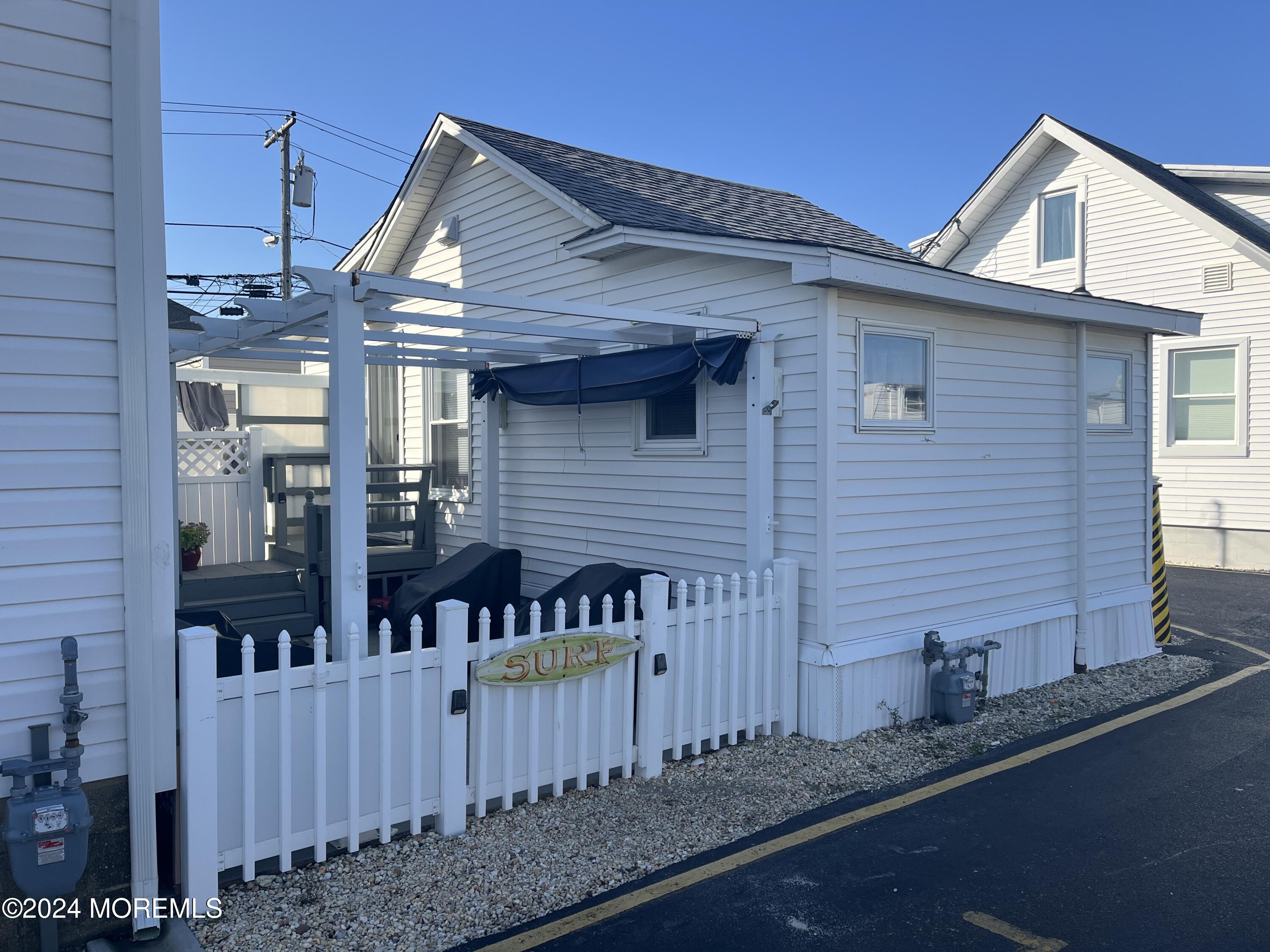 a front view of a house with stairs