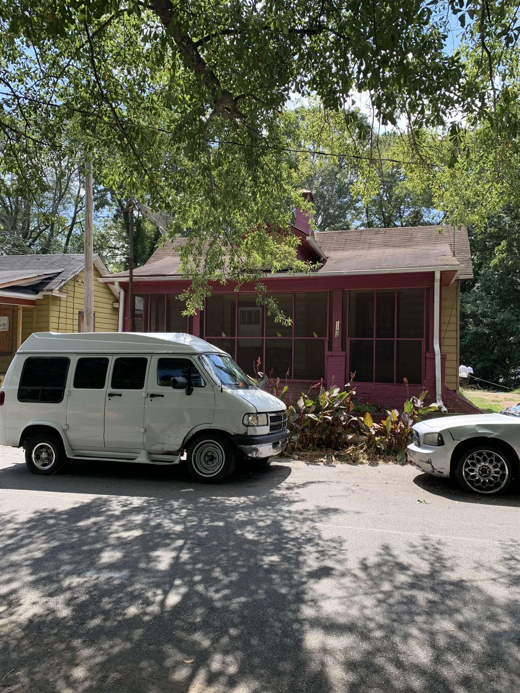 a car parked in front of a house