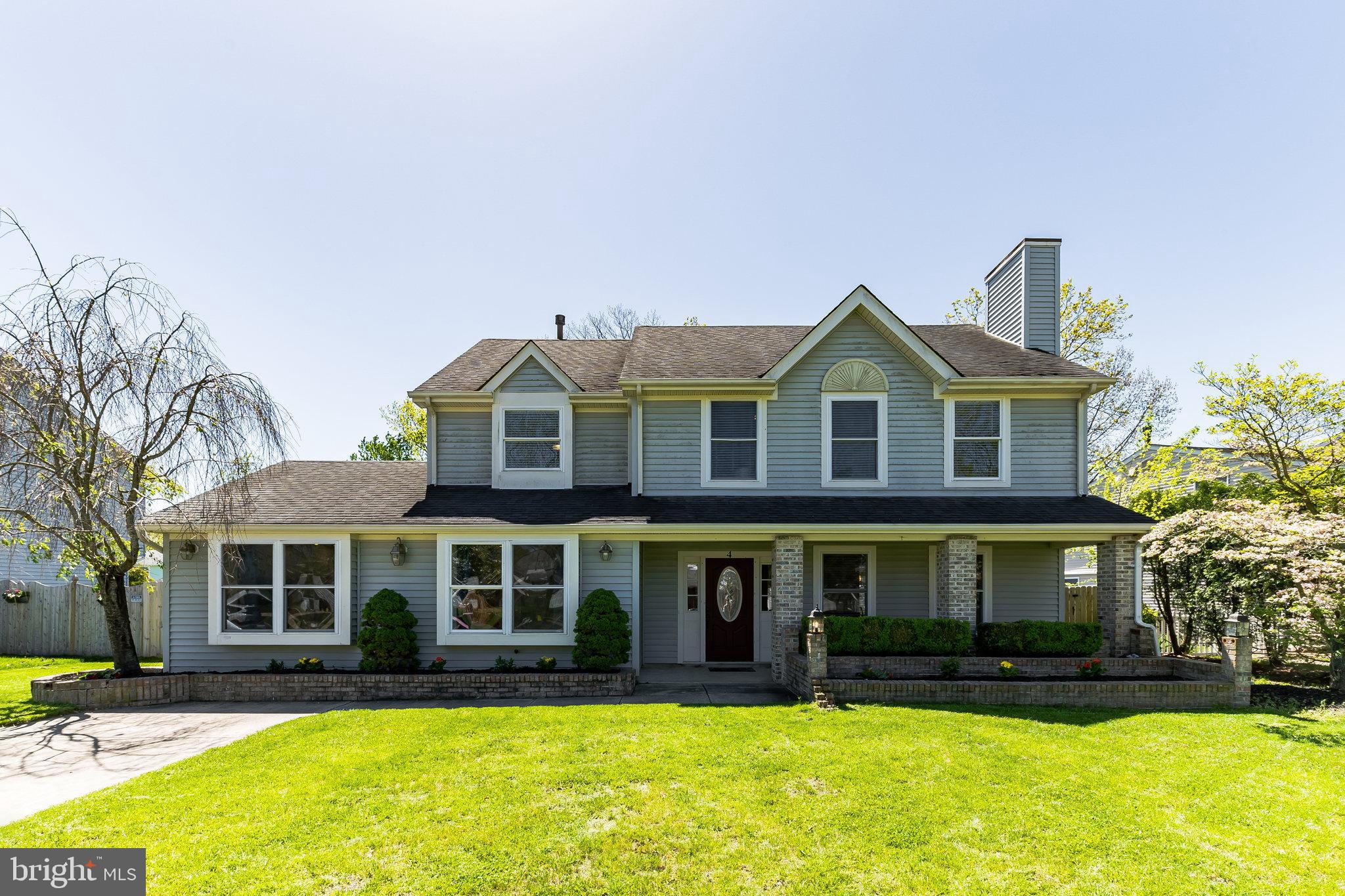 a front view of a house with swimming pool