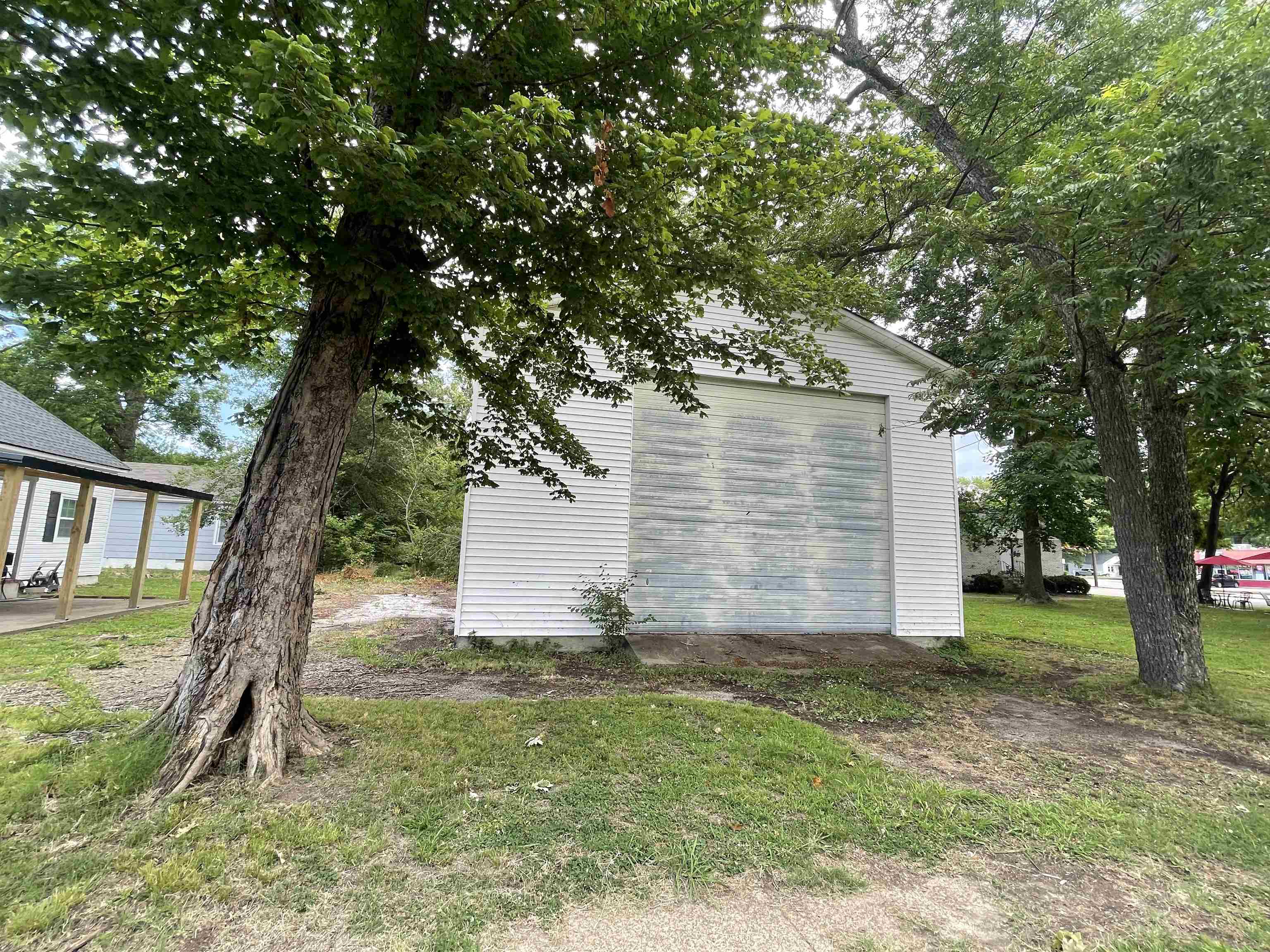 Exterior space featuring a lawn