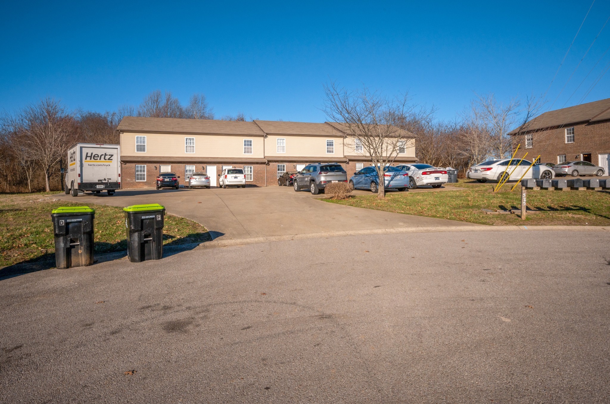 a view of a car park front of house