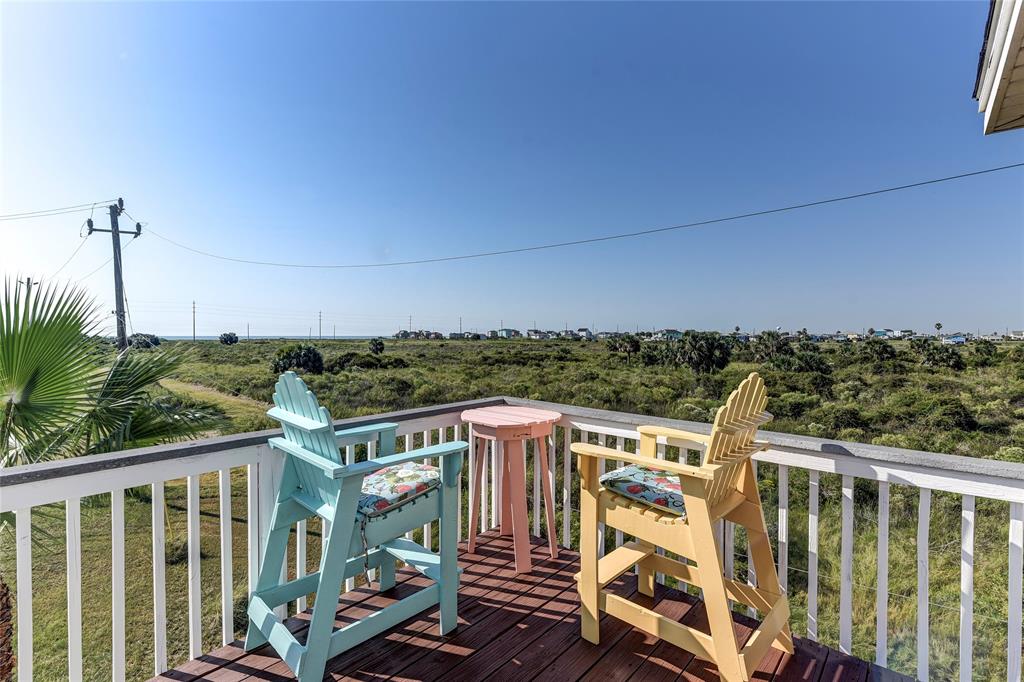 a view of a balcony with city view