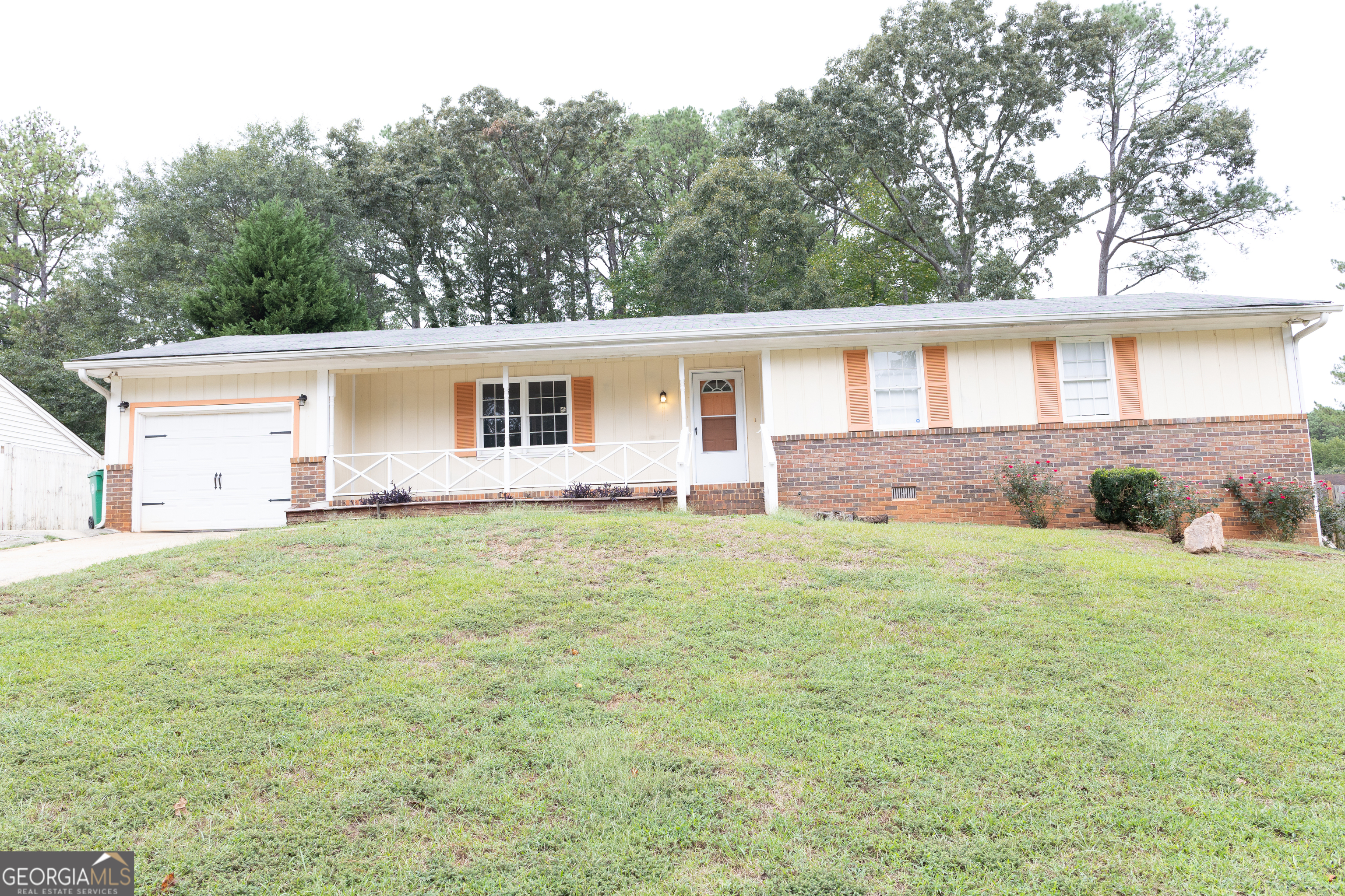 front view of a house with a yard