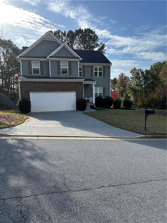 front view of house with a yard