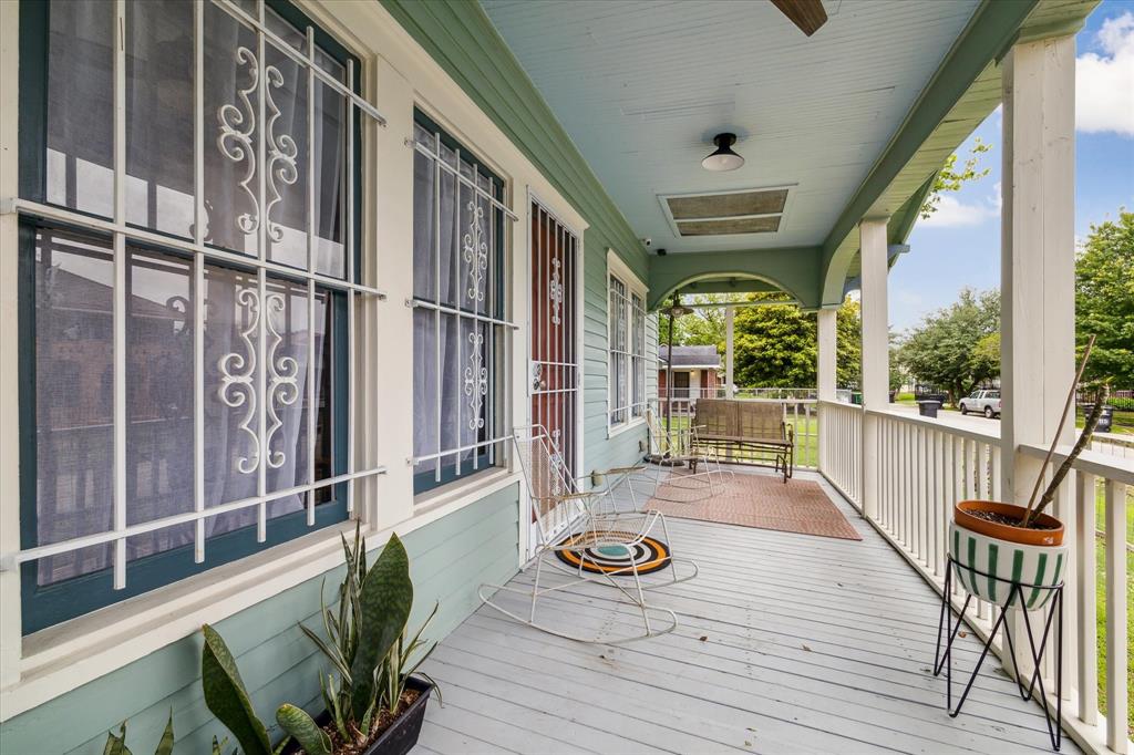 a view of balcony with furniture