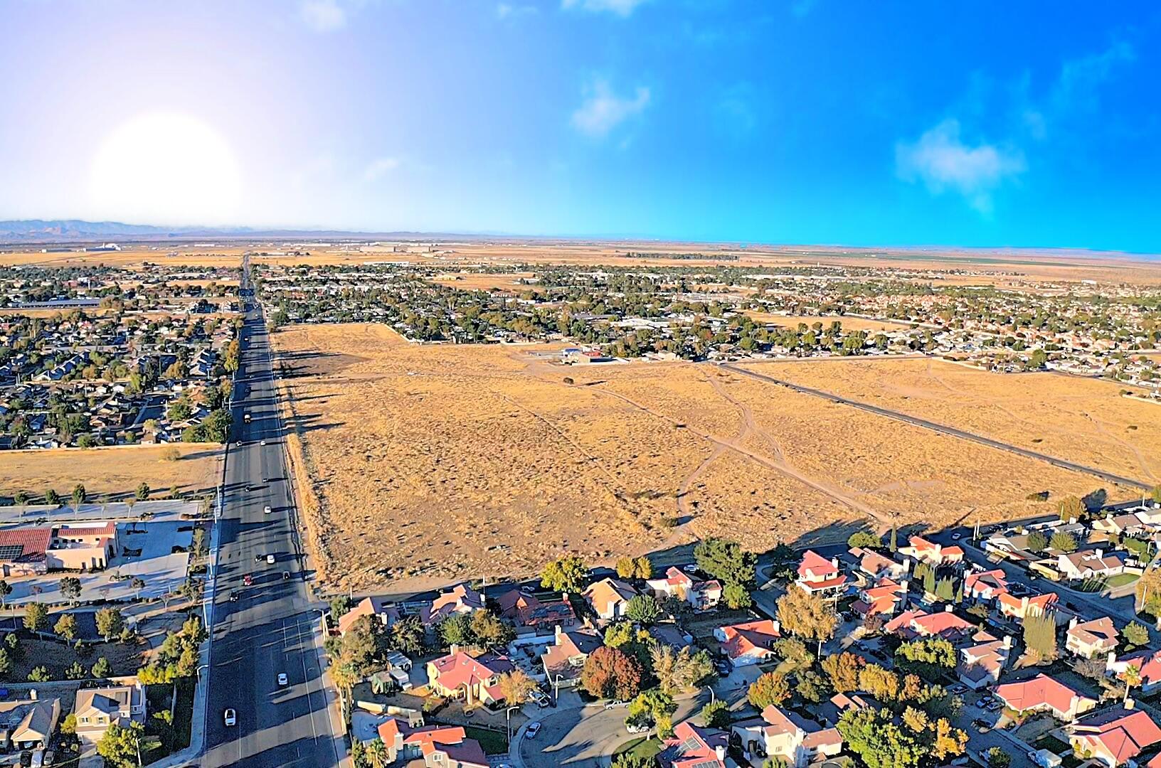 an aerial view of beach and ocean