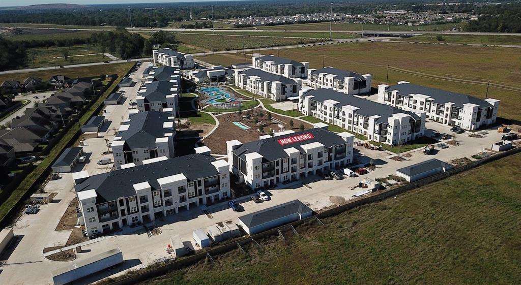 an aerial view of a house with a ocean view