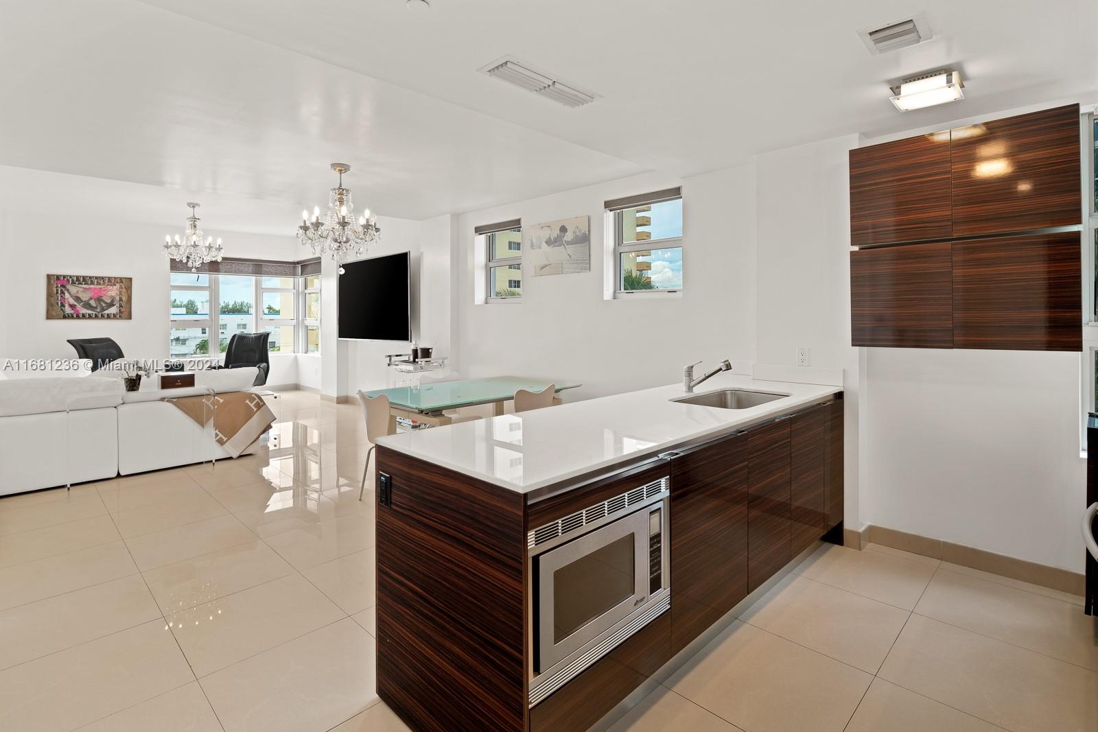 a kitchen with a stove and a microwave