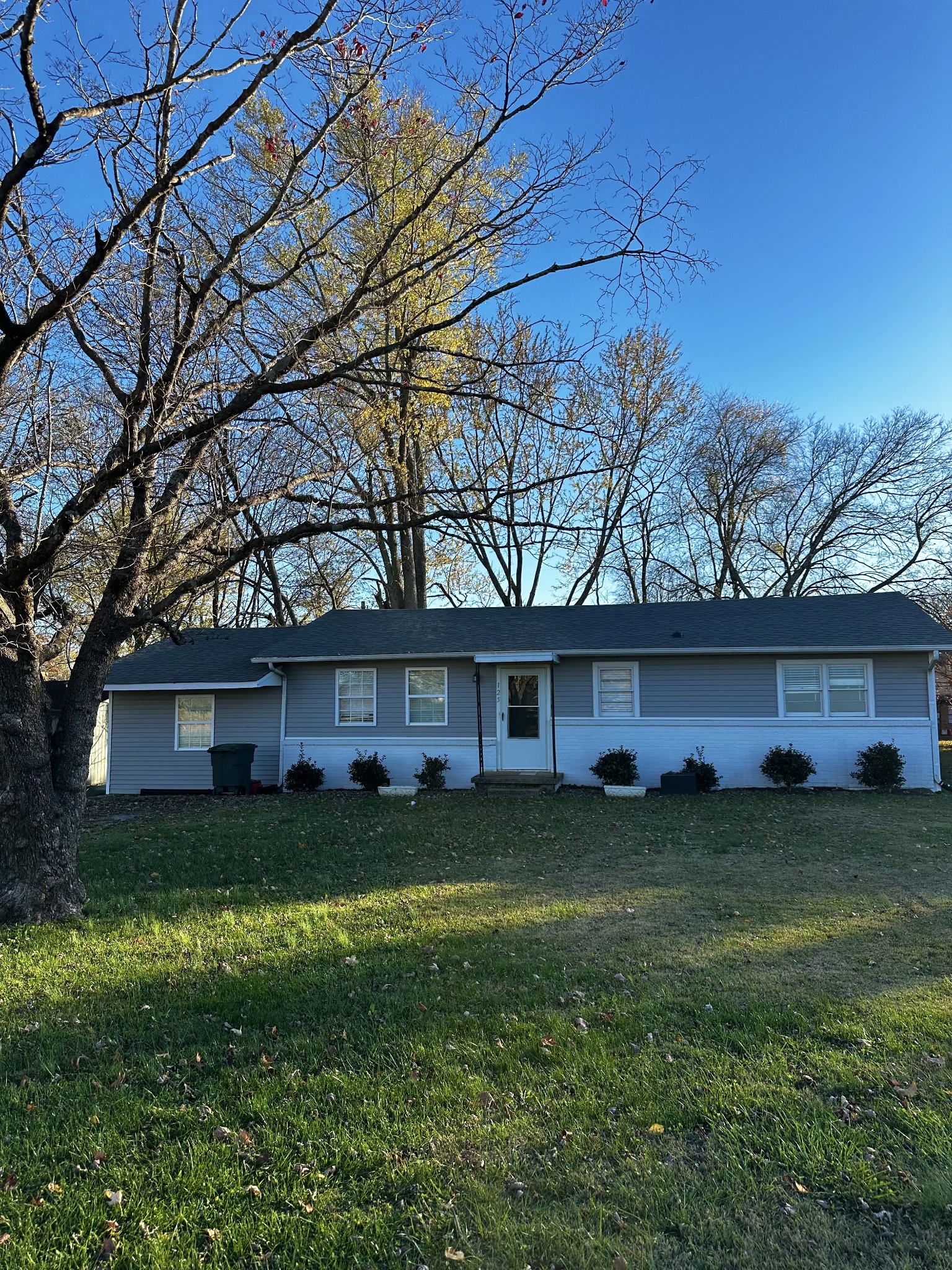 front view of a house with a yard