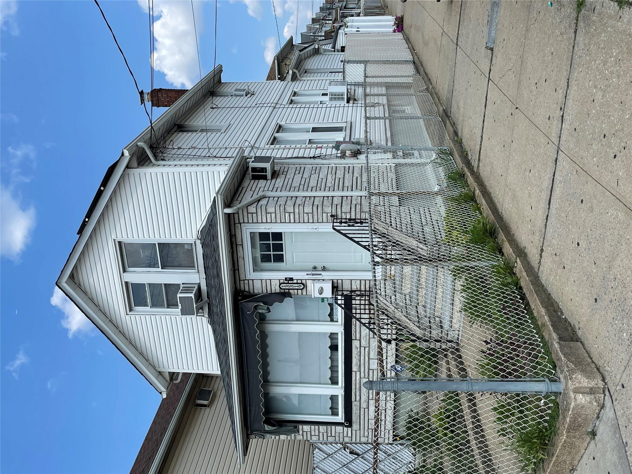 a front view of a house with garage