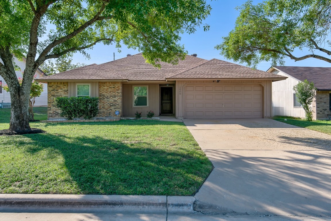 Front of the home, with fresh paint and a new roof.