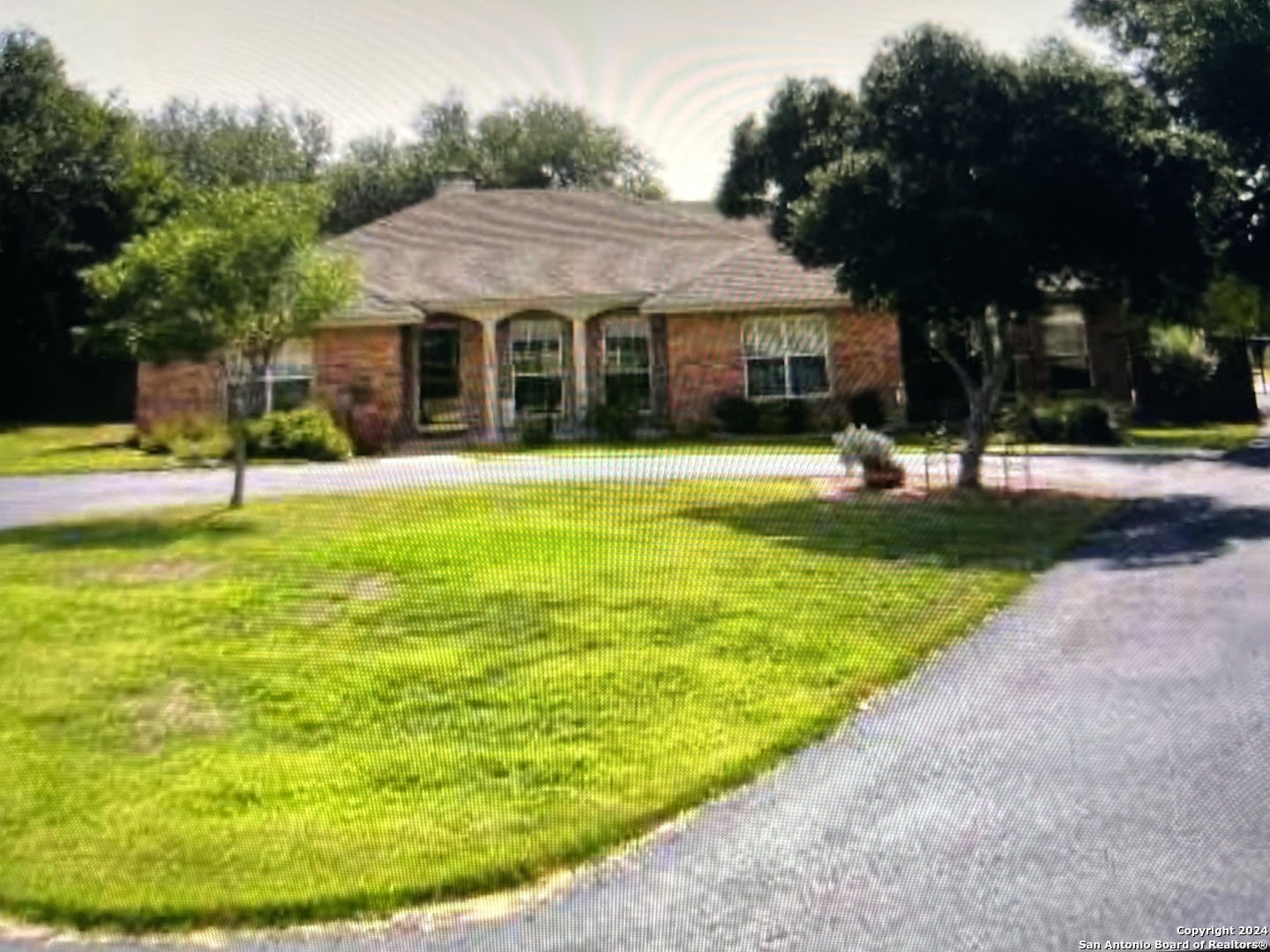 a view of a house with a swimming pool