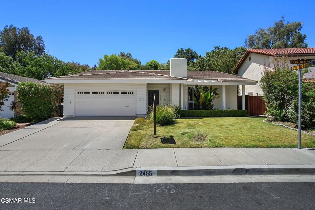 front view of house with a yard