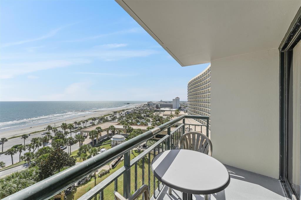 a view of a balcony with an outdoor space