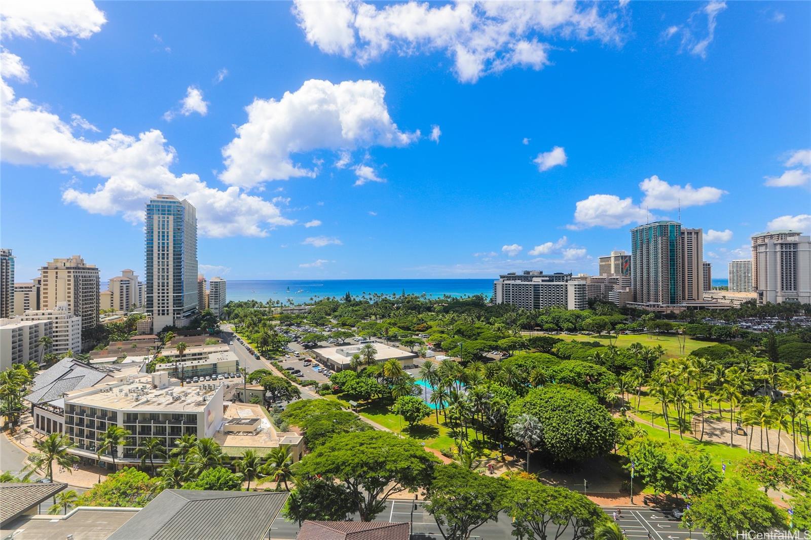 a view of a city with tall buildings