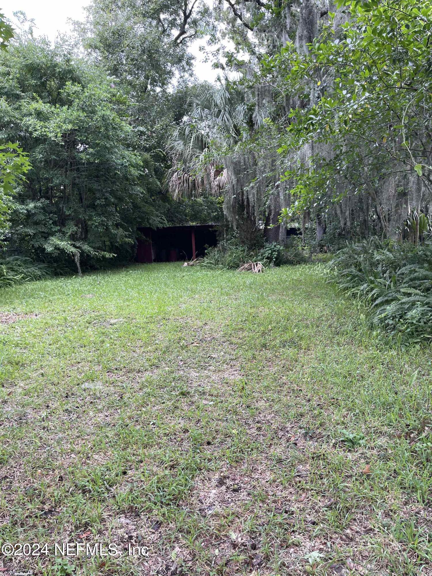 a view of outdoor space and yard