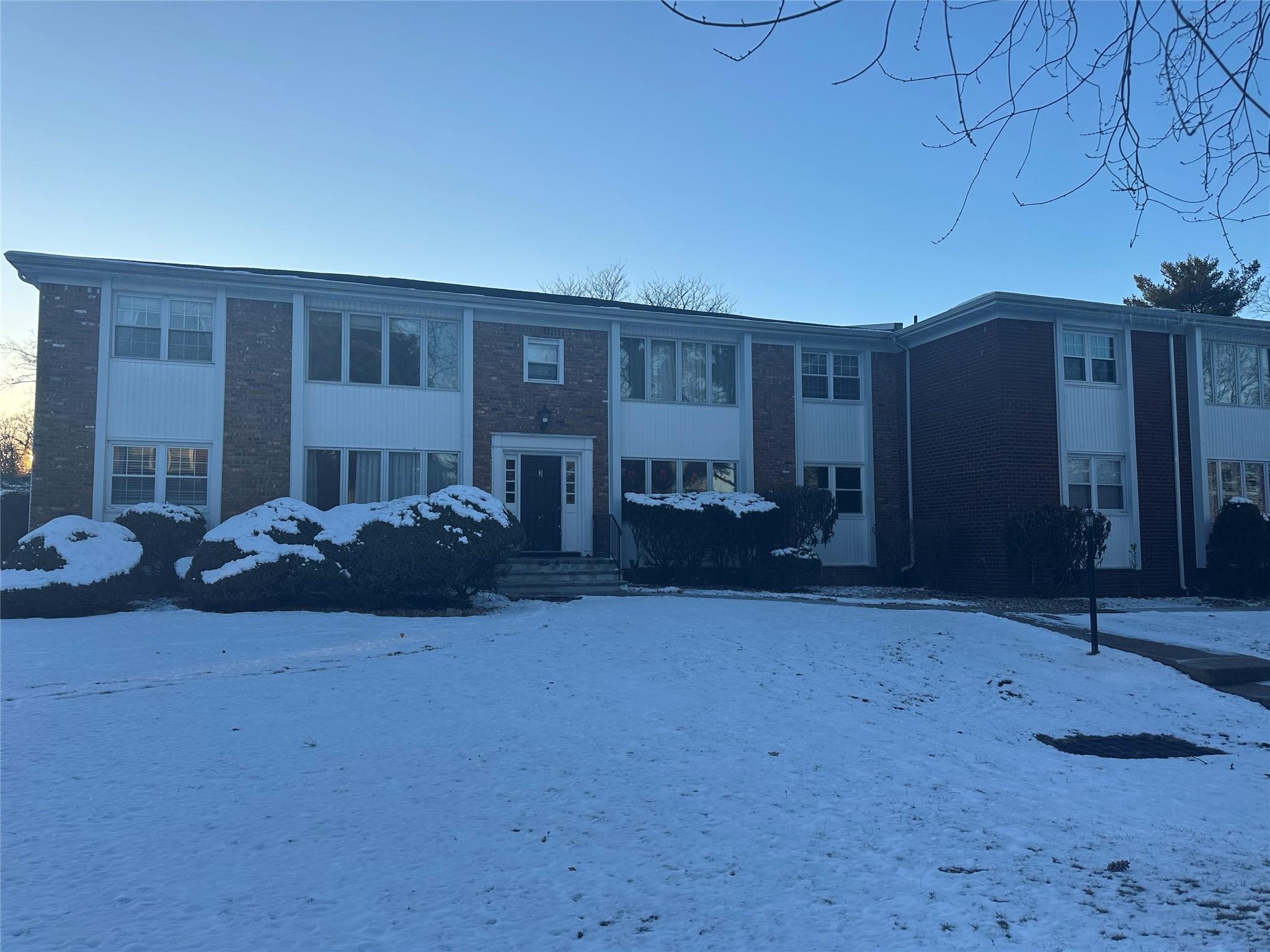 View of snow covered property