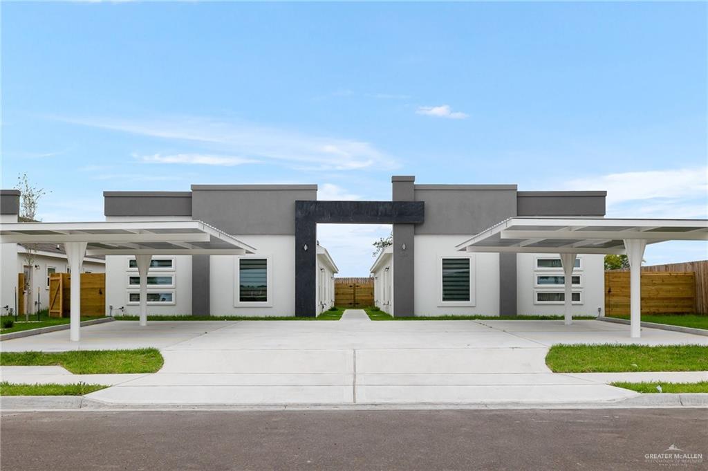 Modern home featuring a carport