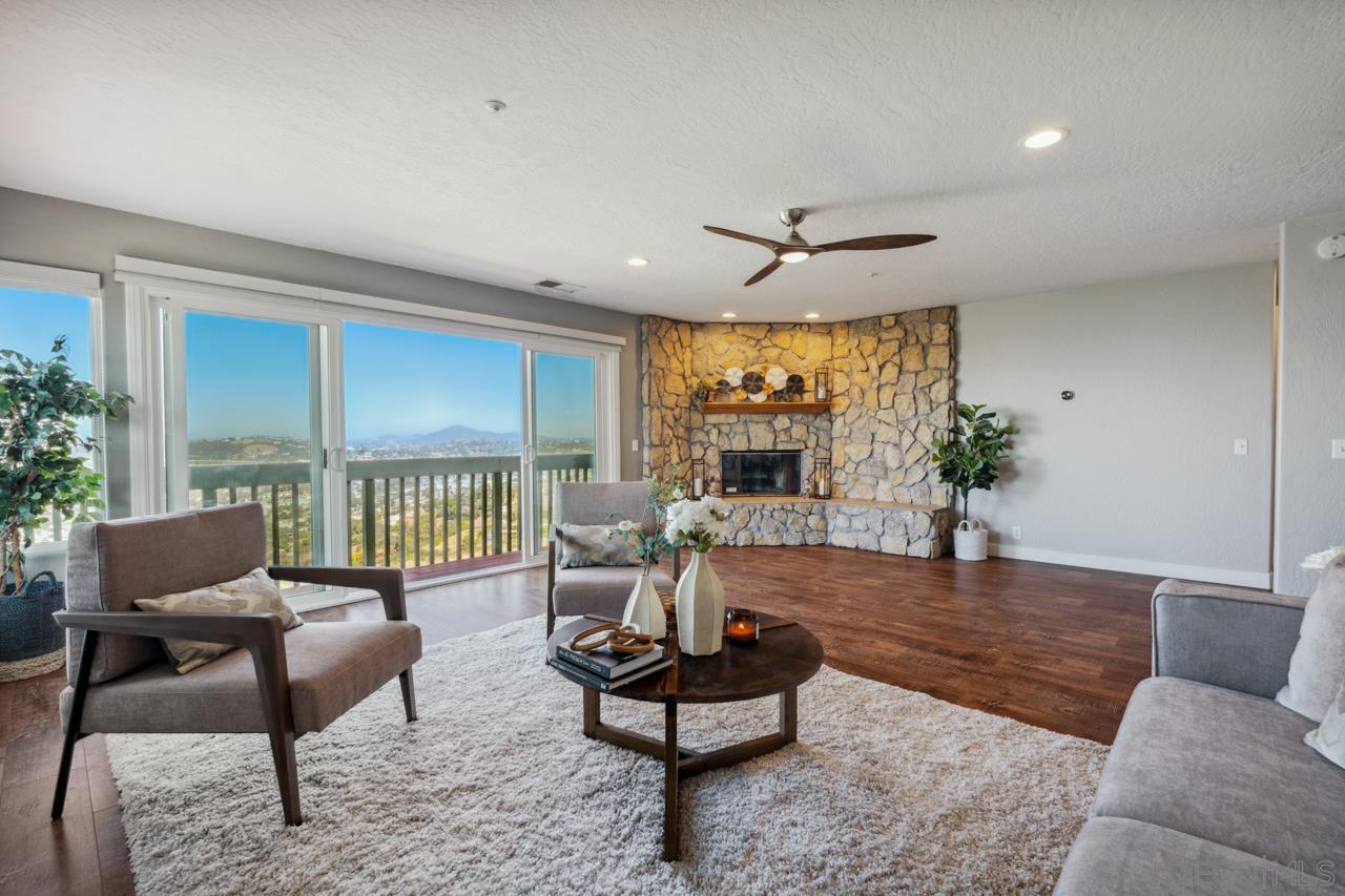 a living room with furniture rug and window