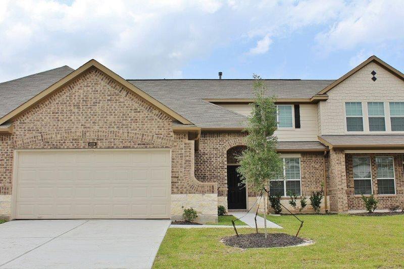 a view of a house with garage